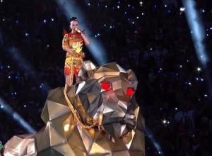 She's wearing a flame dress riding a giant lion with red eyes, nope, nothing evil to see here.