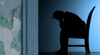 Why does the peeling paint make it extra depressing? Wouldn't a silhouette of someone crying in a chair be enough?